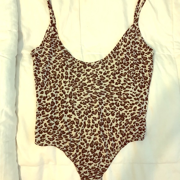 PrettyLittleThing Tops - Leopard print body suit!